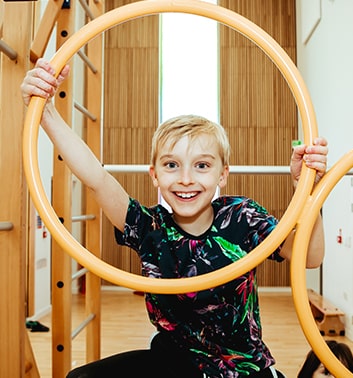 gymnastics boy smiling min