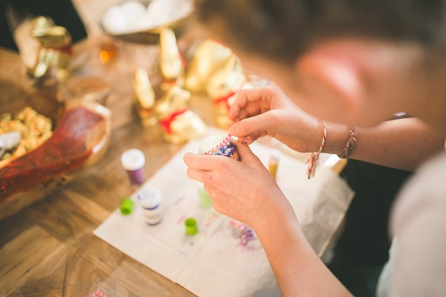 girl, kid, child creating some Spring crafts 