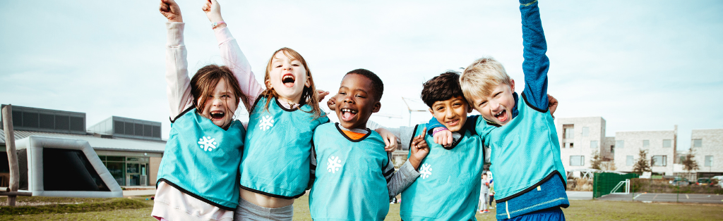 Children cheering at a Premier Education Holiday Camp 2