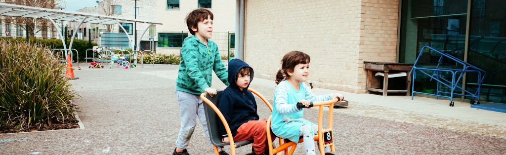 Children playing outside at a Premier Education Wraparound Care club