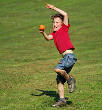 Cricket boy throwing ball red 353x378 1