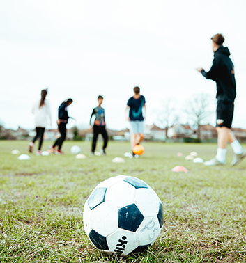 football ball and coach