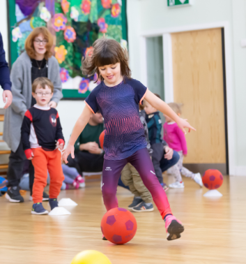 Girl playing football 1