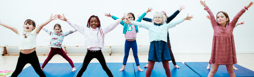 A group of girls enjoy a Premier Education Dance club.