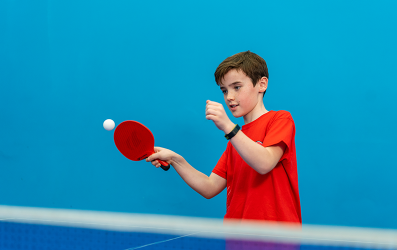 table tennis hits ball